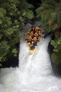 Rafting the 7 metre Tutea falls on the Kaituna River, Rotorua, New Zealand